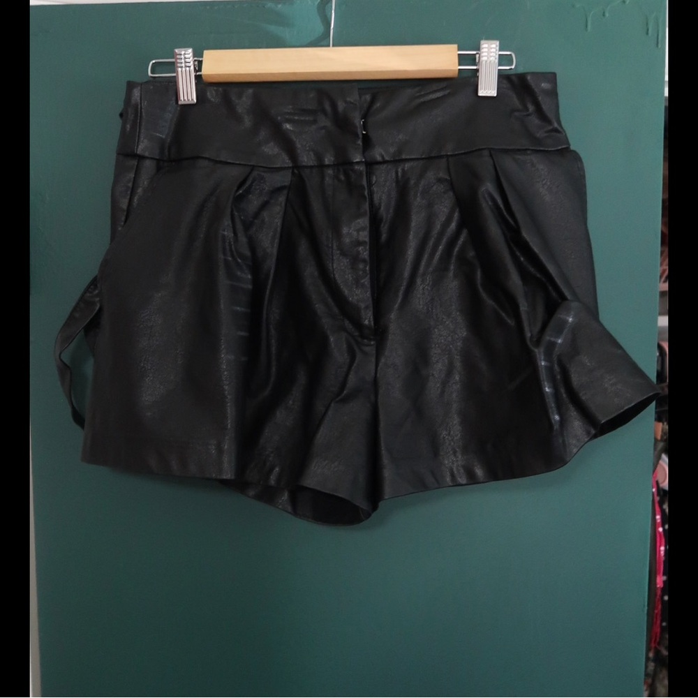 Faux leather shorts with straps